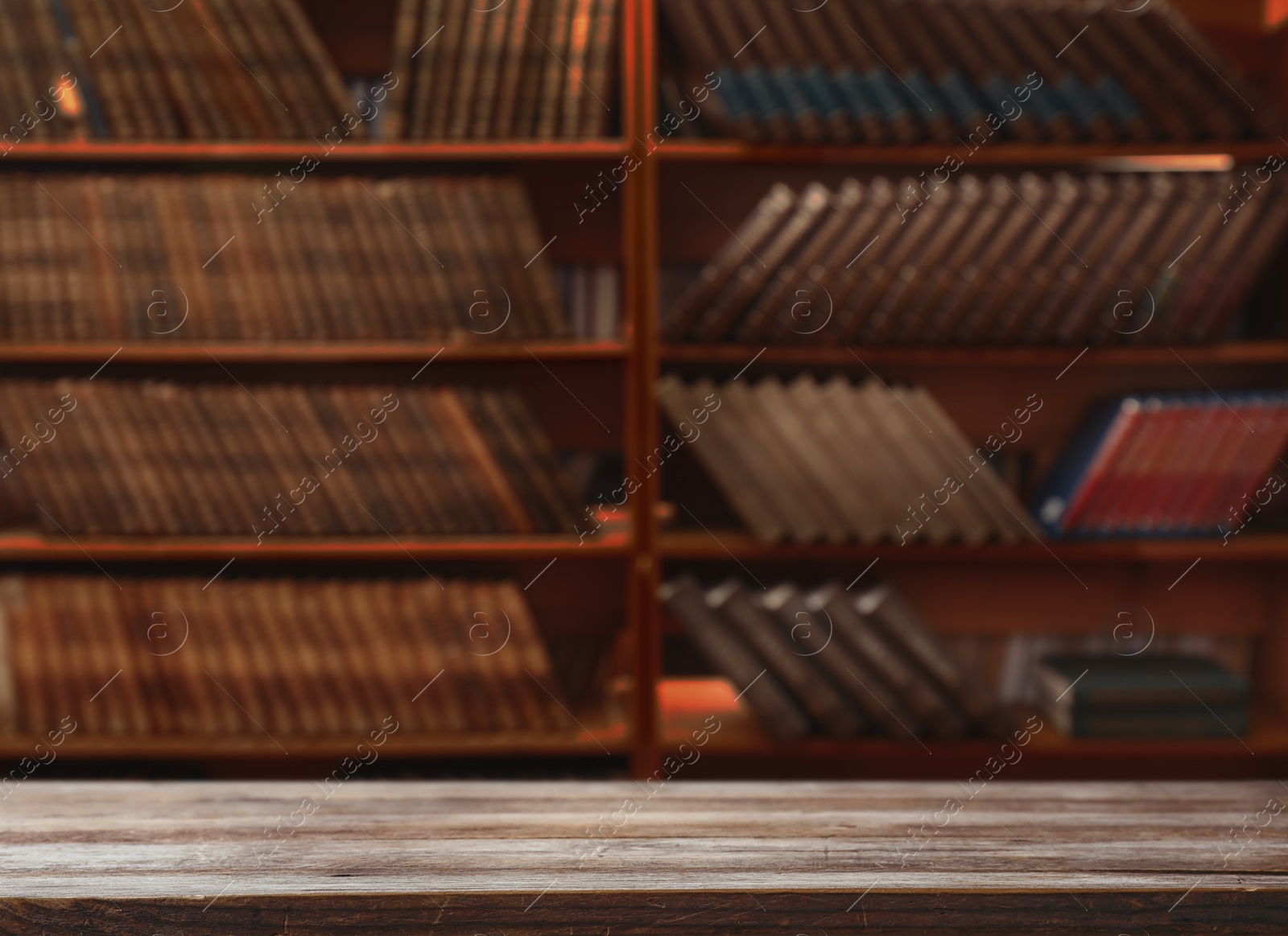 Image of Empty wooden table in library. Space for design 