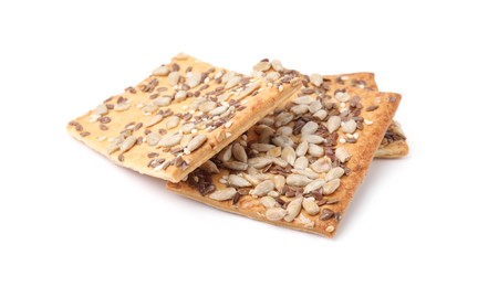 Cereal crackers with flax, sunflower and sesame seeds isolated on white