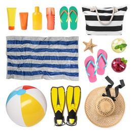 Set with towel and other beach accessories on white background