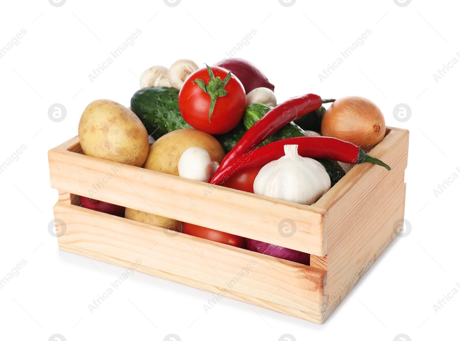 Photo of Wooden crate full of fresh vegetables on white background