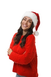 Young woman in Christmas sweater and hat on white background