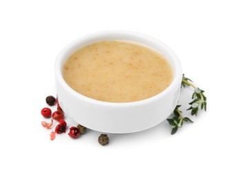 Photo of Delicious turkey gravy, thyme and peppercorns isolated on white