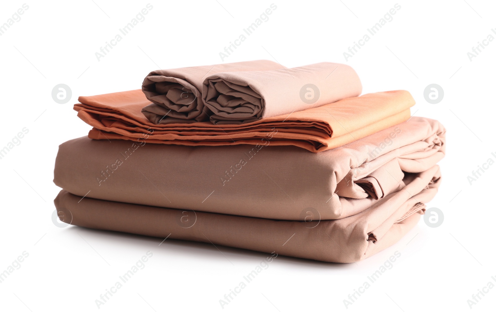 Photo of Stack of clean bed sheets isolated on white