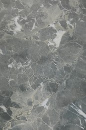 Photo of Texture of grey marble surface as background, closeup