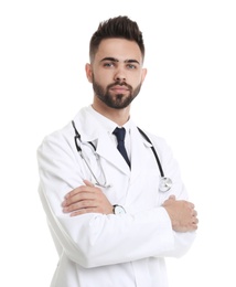 Photo of Young male doctor in uniform isolated on white