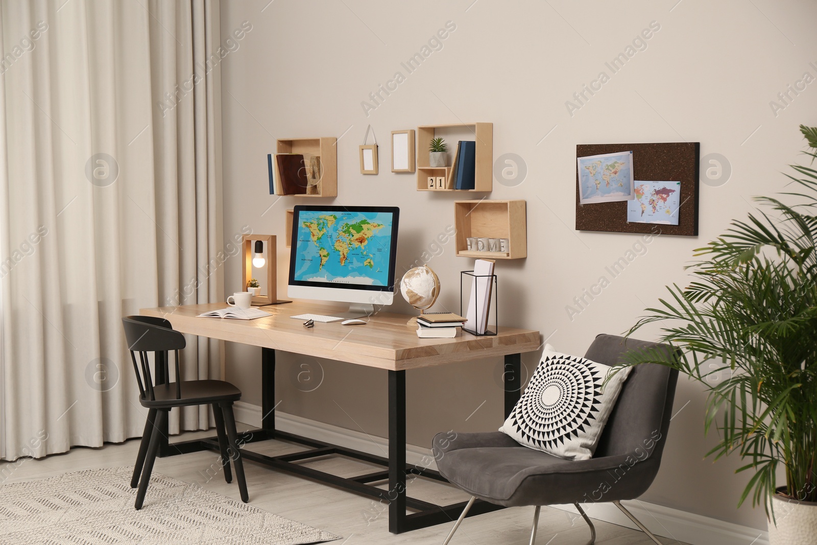 Photo of Room interior with comfortable workplace. Modern computer on wooden desk