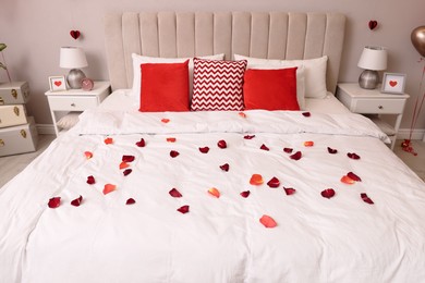 Photo of Cozy bedroom decorated for Valentine Day. Interior design