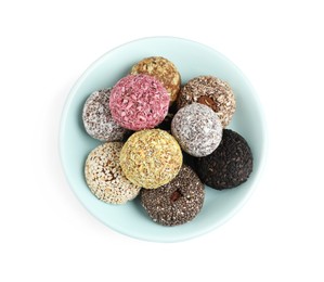 Photo of Different delicious vegan candy balls on white background, top view