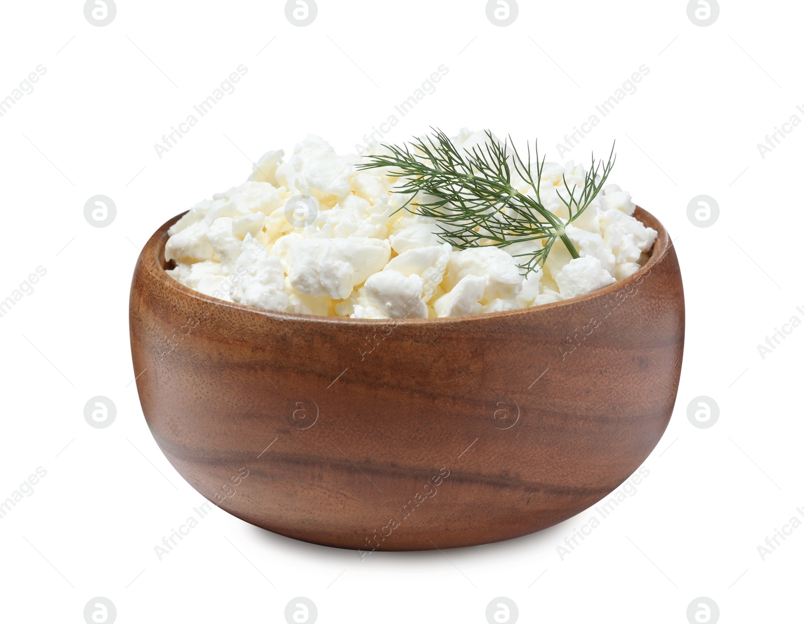 Photo of Fresh cottage cheese with dill in wooden bowl isolated on white