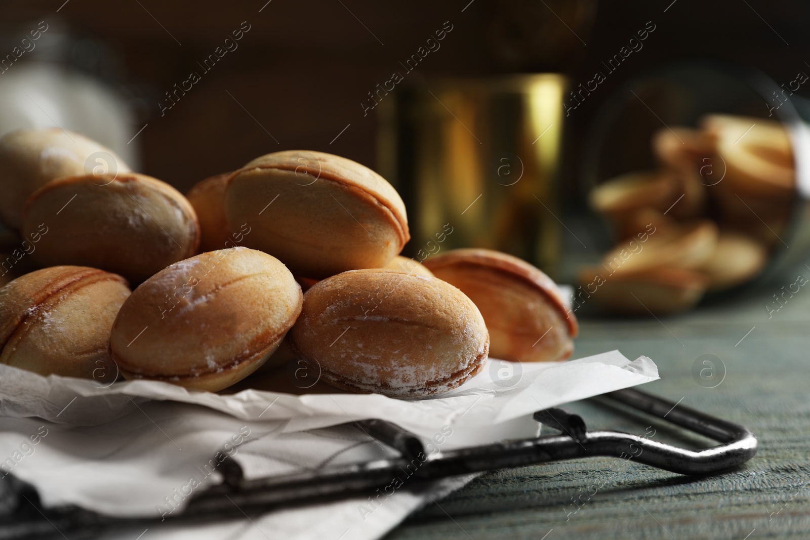 Photo of Freshly baked homemade walnut shaped cookies, closeup