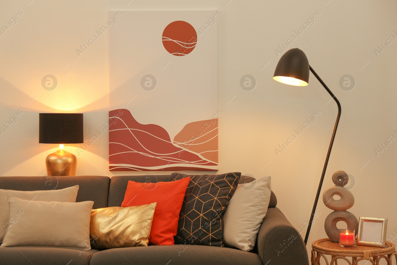 Photo of Stylish living room interior with comfortable sofa and floor lamp