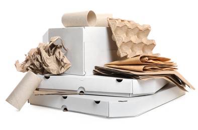 Photo of Stack of different waste paper on white background
