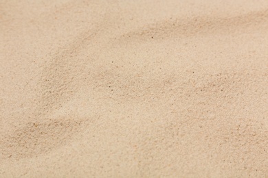 Dry sand on beach as background, closeup