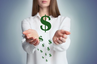 Image of Woman demonstrating virtual dollar signs on light background, closeup