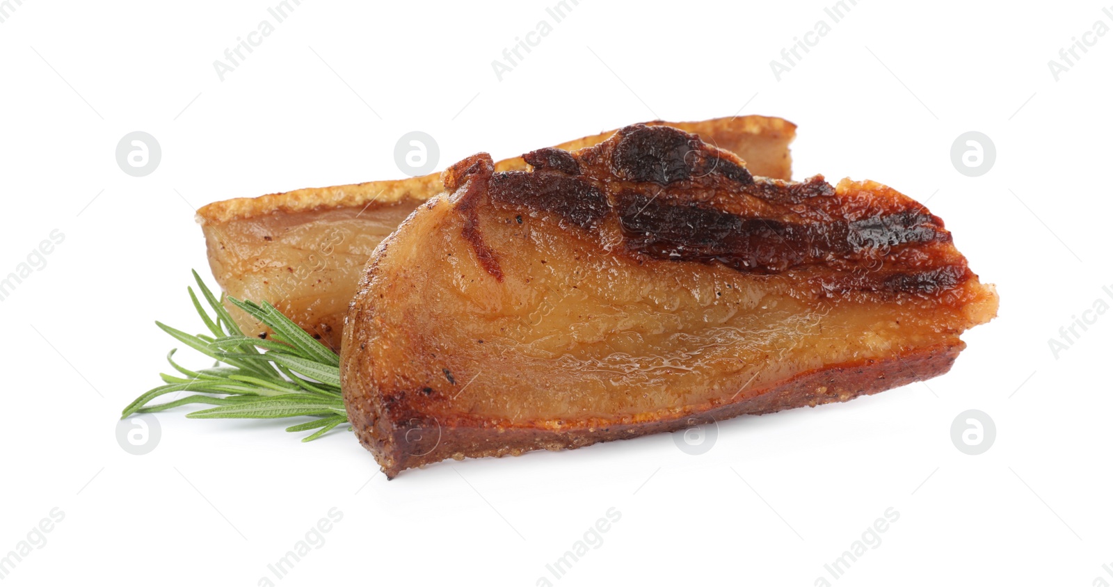 Photo of Tasty fried cracklings with rosemary on white background. Cooked pork lard
