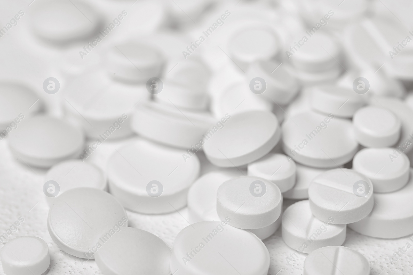 Photo of Pills on white background, closeup