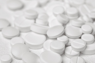 Photo of Pills on white background, closeup