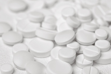 Pills on white background, closeup