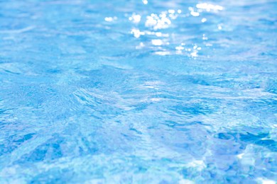 Rippled water in swimming pool as background