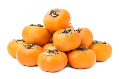 Whole delicious juicy persimmons on white background