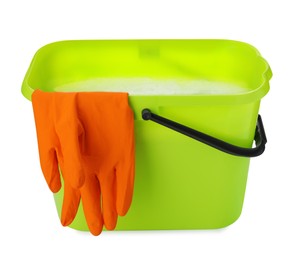 Photo of Green bucket with gloves isolated on white