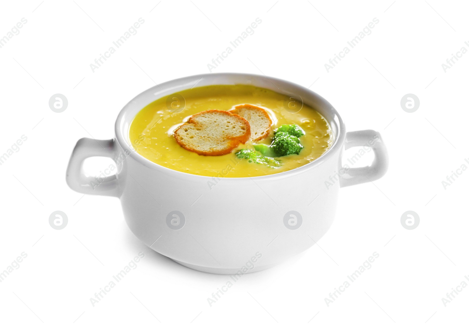 Photo of Bowl of cheese cream soup with broccoli and croutons on white background