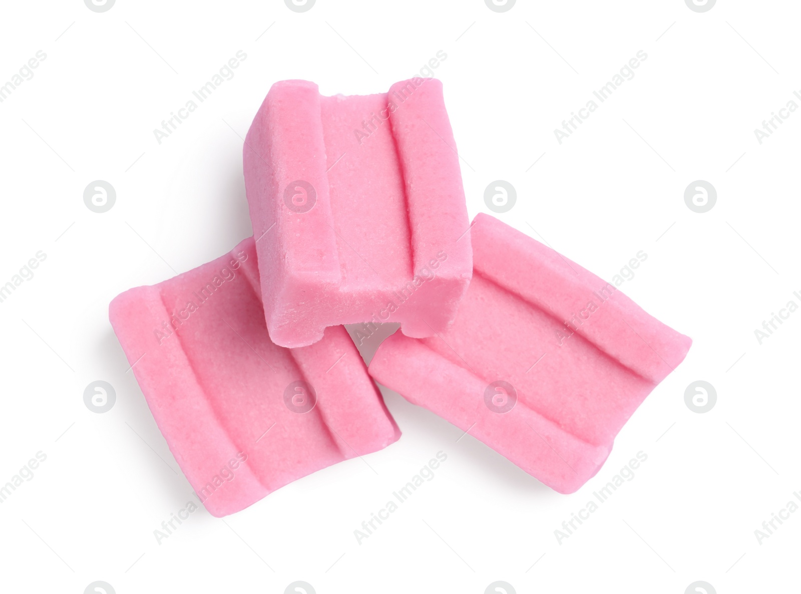 Photo of Tasty pink bubble gums isolated on white, top view