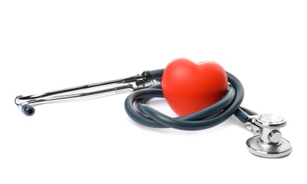 Photo of Red heart and stethoscope on white background. Cardiology concept