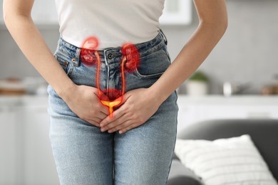 Image of Woman suffering from cystitis at home, closeup. Illustration of urinary system