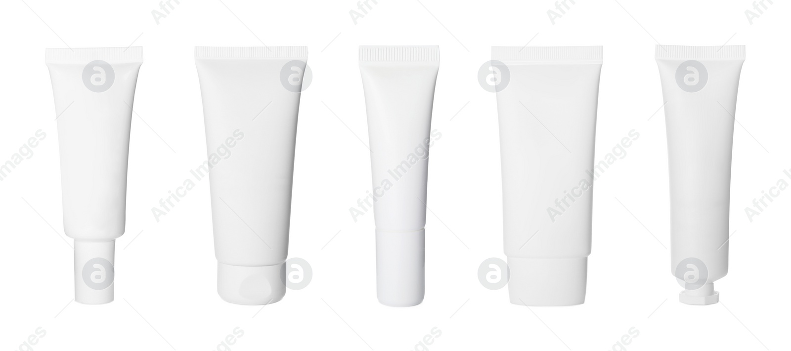 Image of Set with blank tubes of cosmetic products on white background. Mockup for design