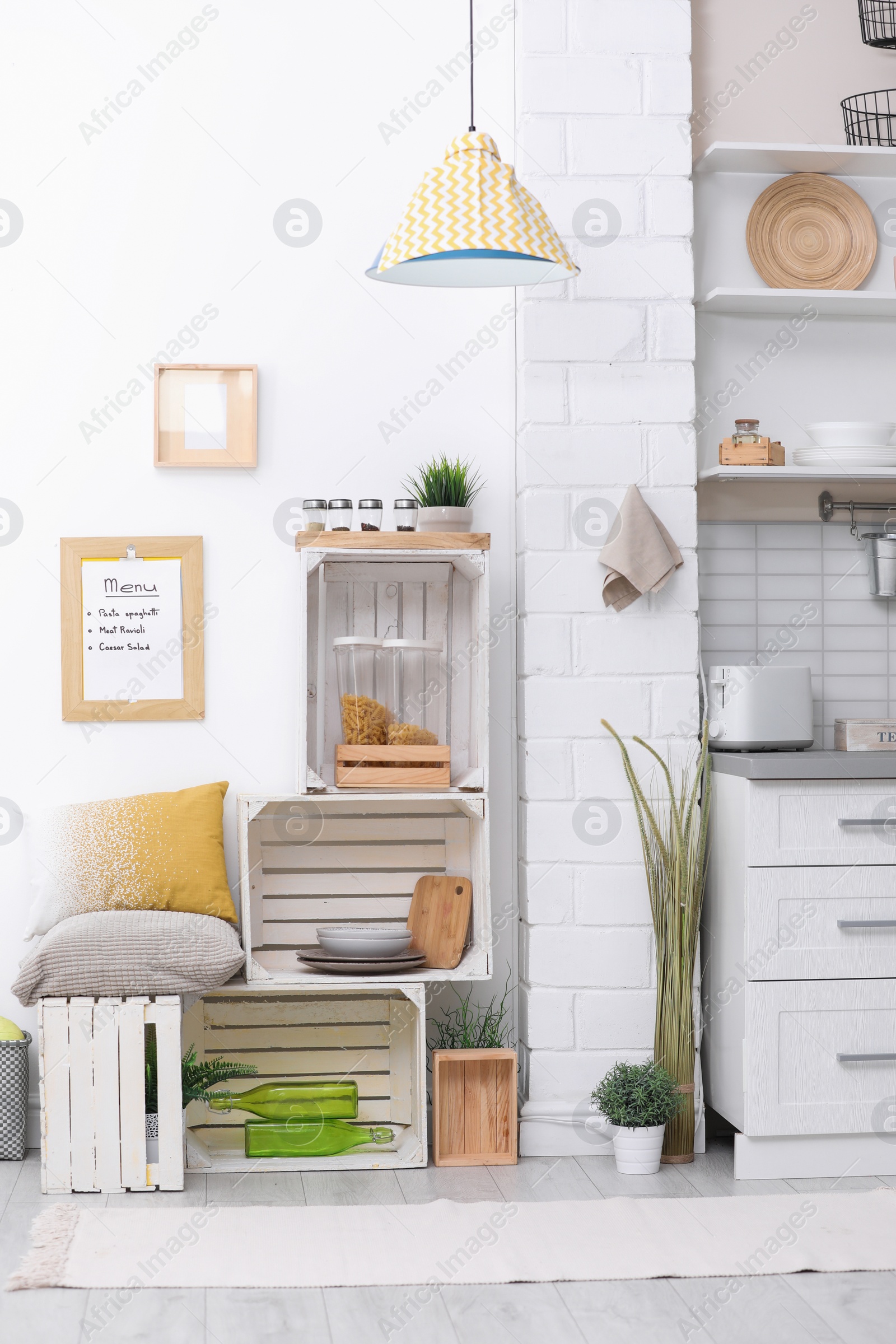 Photo of Modern kitchen interior with wooden crates as eco furniture