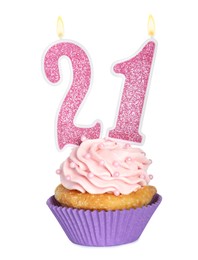 Photo of 21th birthday. Delicious cupcake with number shaped candles for coming of age party on white background