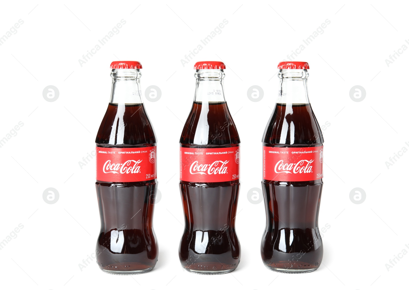 Photo of MYKOLAIV, UKRAINE - NOVEMBER 14, 2018: Bottles of Coca-Cola on white background