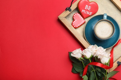 Photo of Romantic breakfast and roses on red background, flat lay with space for text. Valentine's day celebration