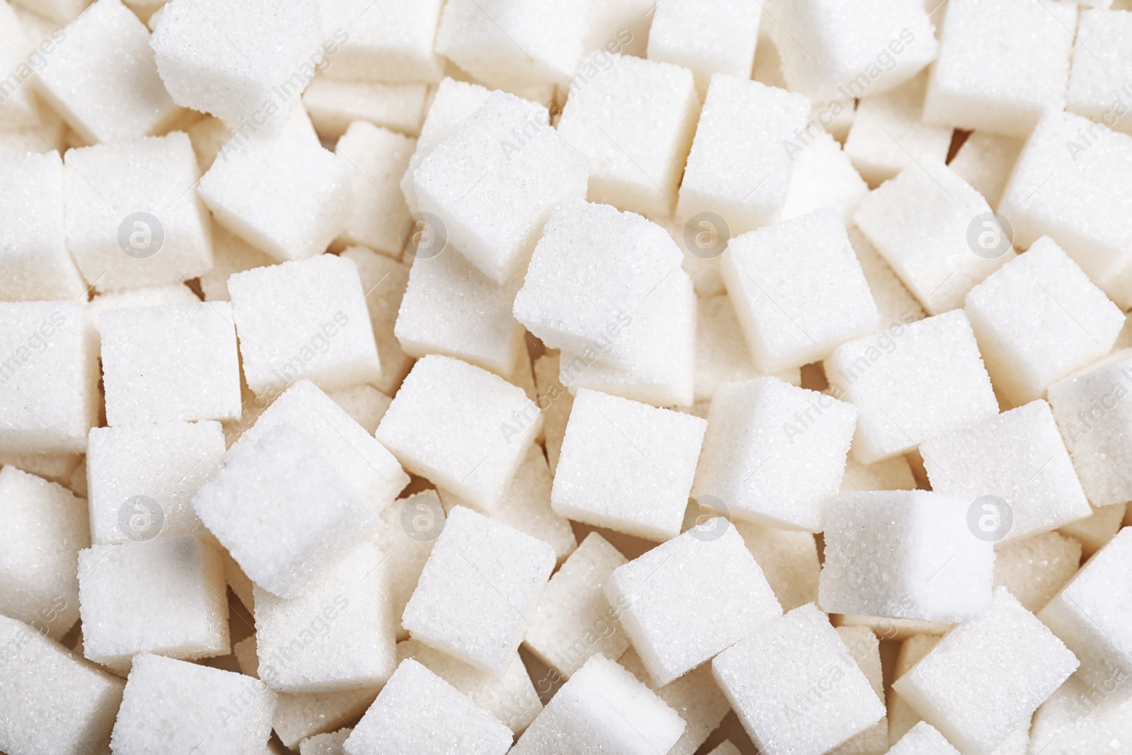 Photo of Top view of refined sugar as background