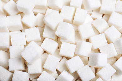 Photo of Top view of refined sugar as background