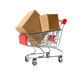 Photo of Shopping cart with boxes isolated on white. Logistics and wholesale concept