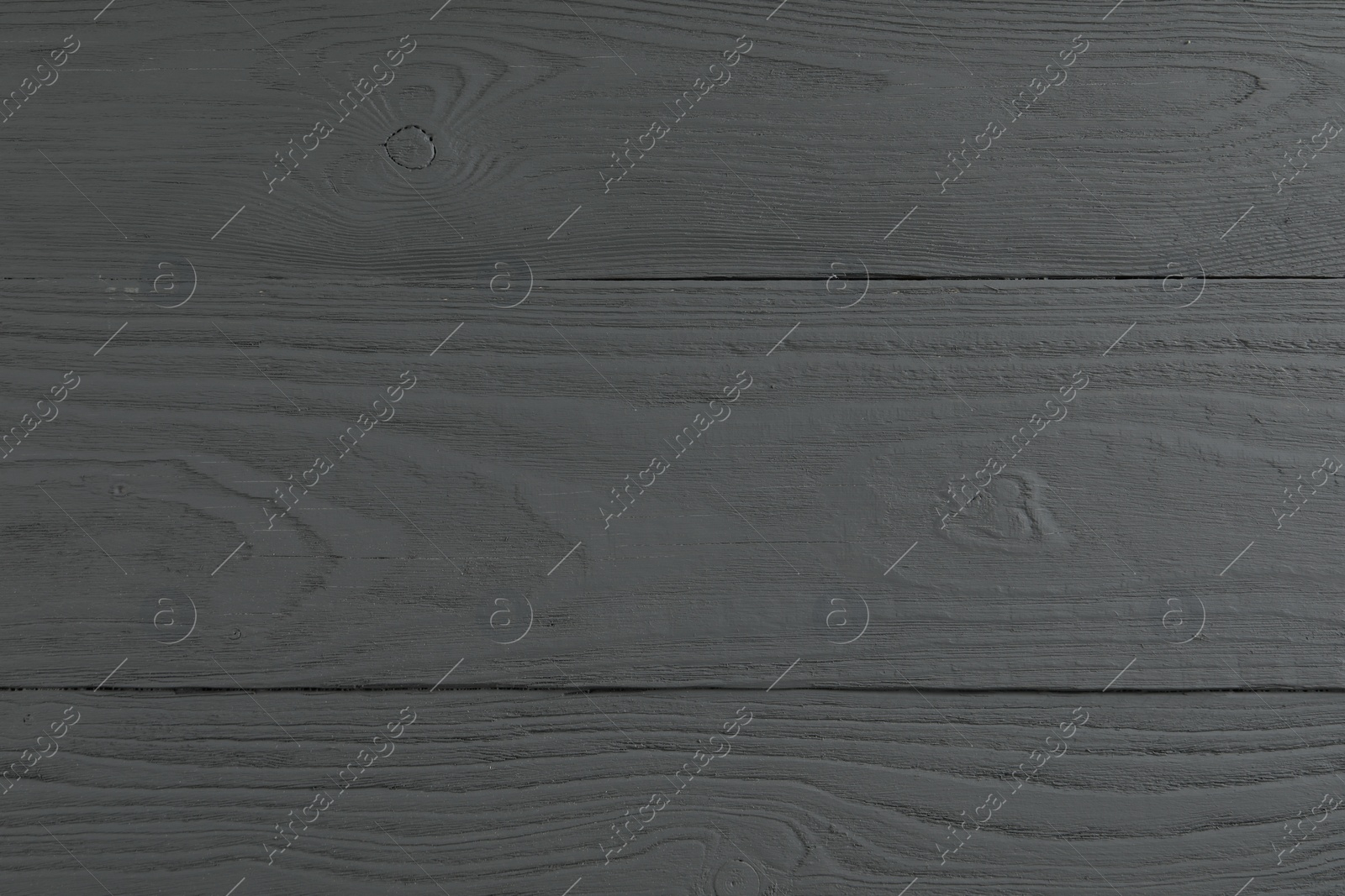 Photo of Texture of grey wooden surface as background, closeup