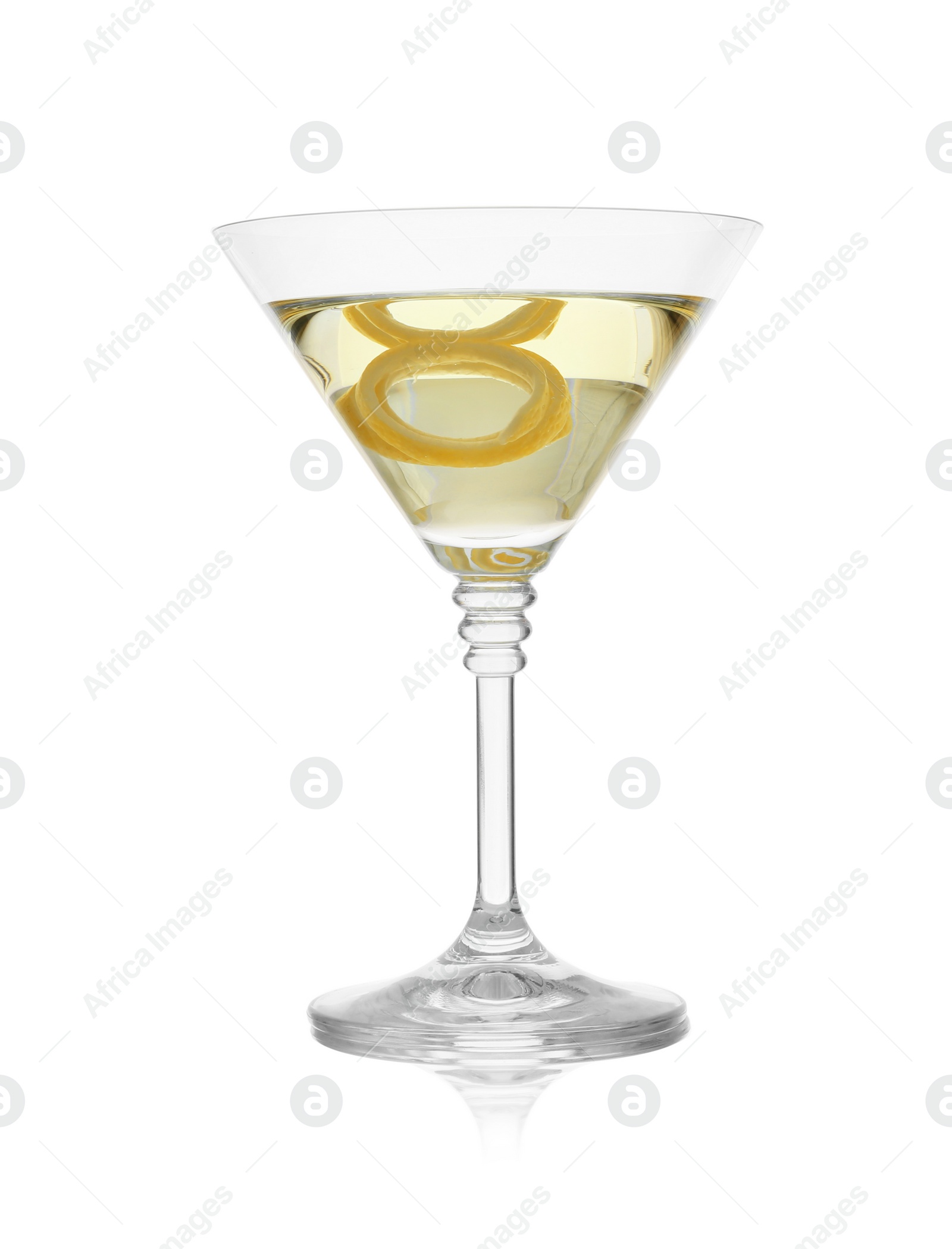 Photo of Glass of martini cocktail with lemon zest on white background