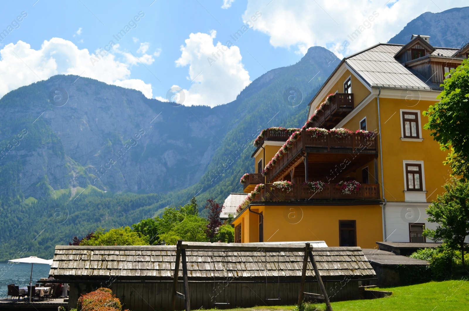 Photo of Picturesque view of beautiful building near mountains