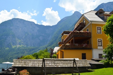 Picturesque view of beautiful building near mountains