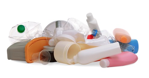 Photo of Pile of plastic garbage on white background