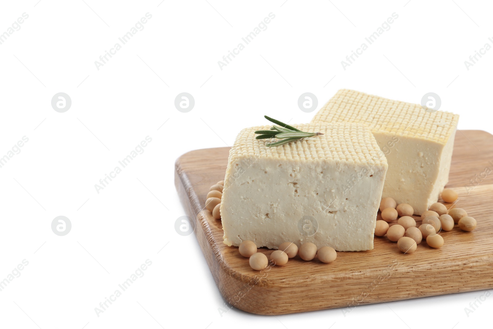 Photo of Pieces of delicious tofu with rosemary and soy on white background