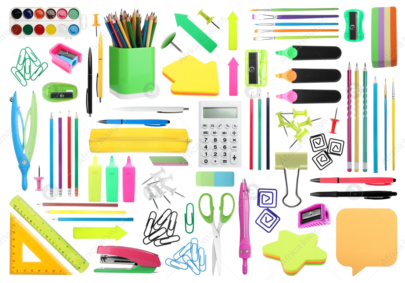 Image of Set of bright school stationery on white background