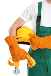 Photo of Male industrial worker in uniform on white background, closeup. Safety equipment