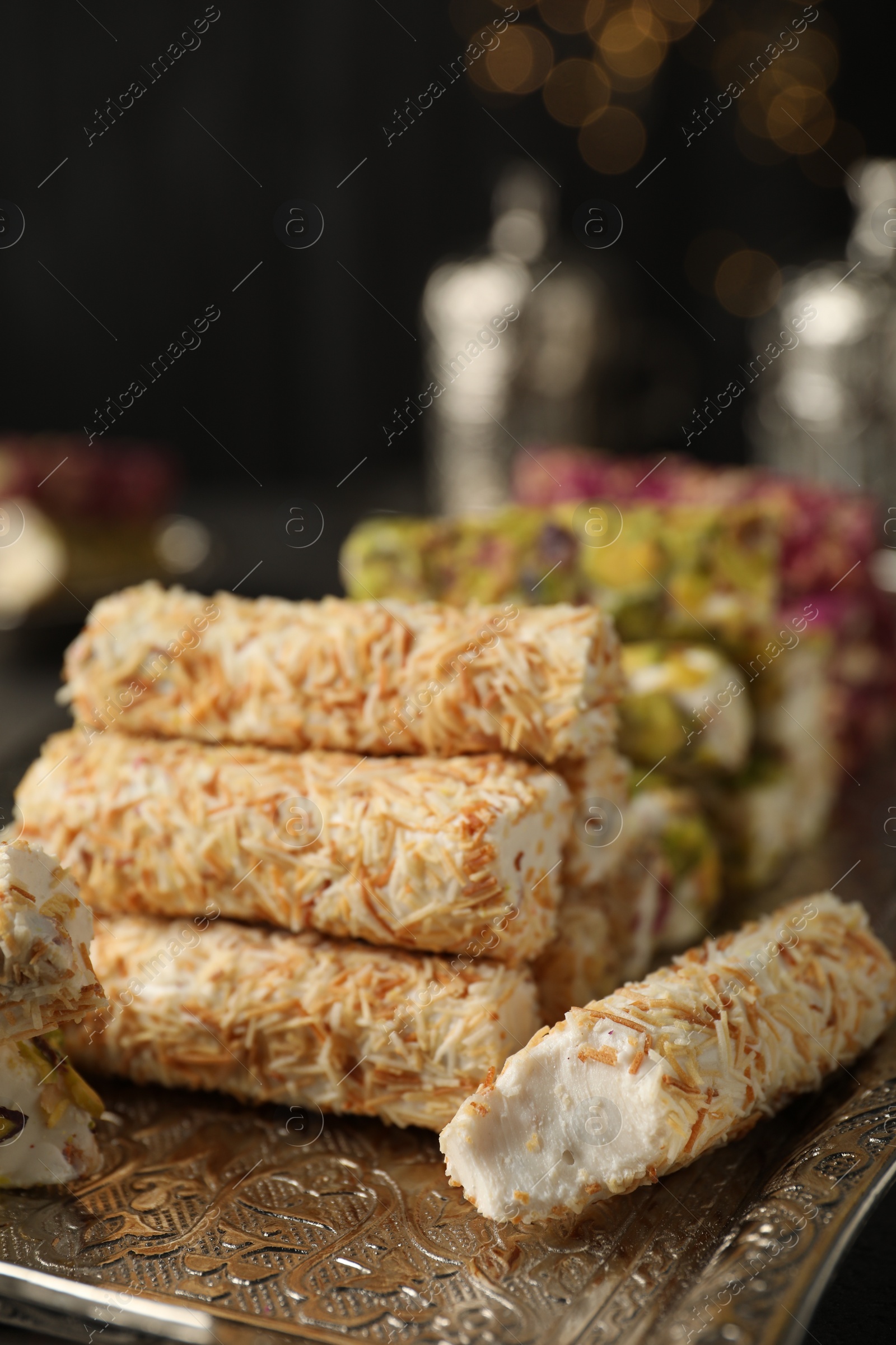 Photo of Turkish delight dessert on tray, closeup. Traditional sweet