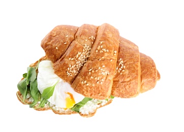 Photo of Delicious croissant with arugula and egg isolated on white, top view