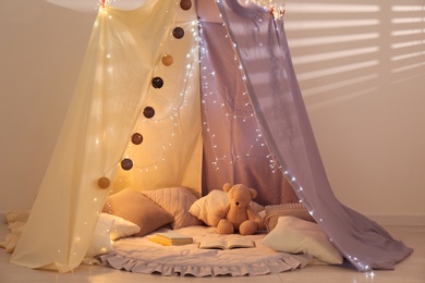 Modern children's room interior with play tent