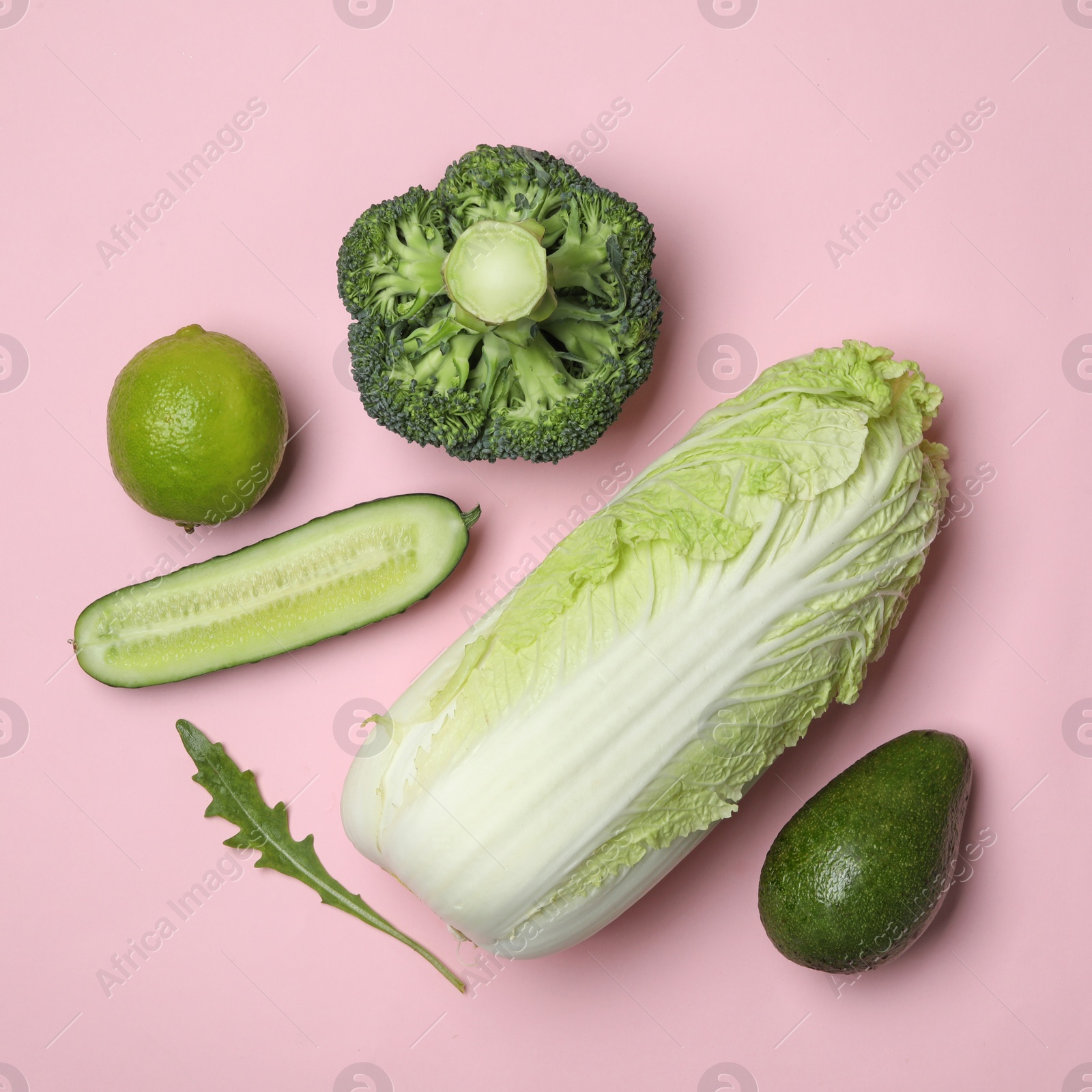 Photo of Flat lay composition with fresh ripe vegetables on color background