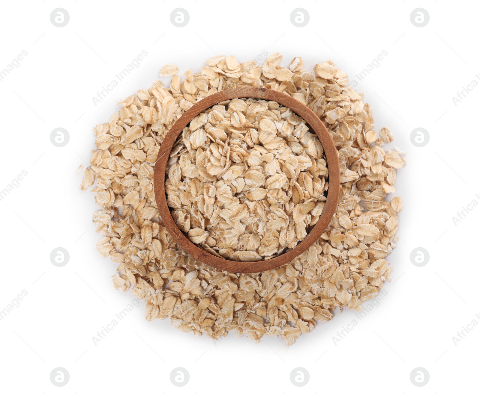 Photo of Wooden bowl of oatmeal isolated on white, top view
